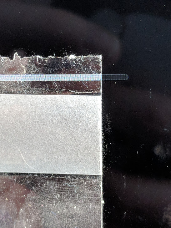 a piece of tape over a white progress bar