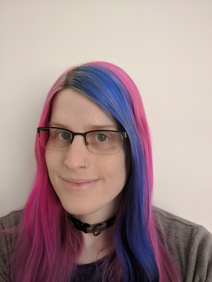 a picture of me with pink hair and a freshly dyed vivid blue streak