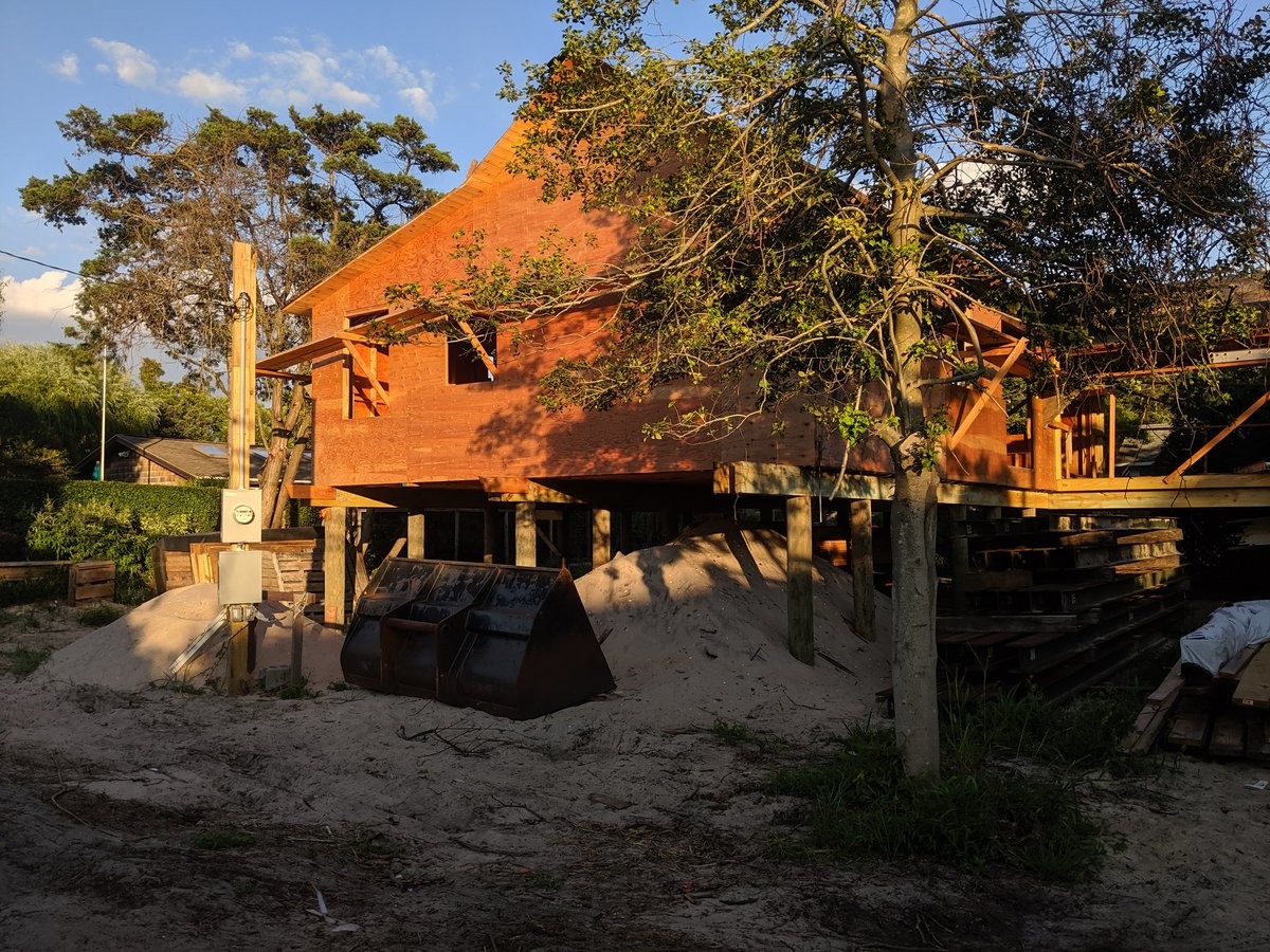 A house raised off the ground on wooden pilings