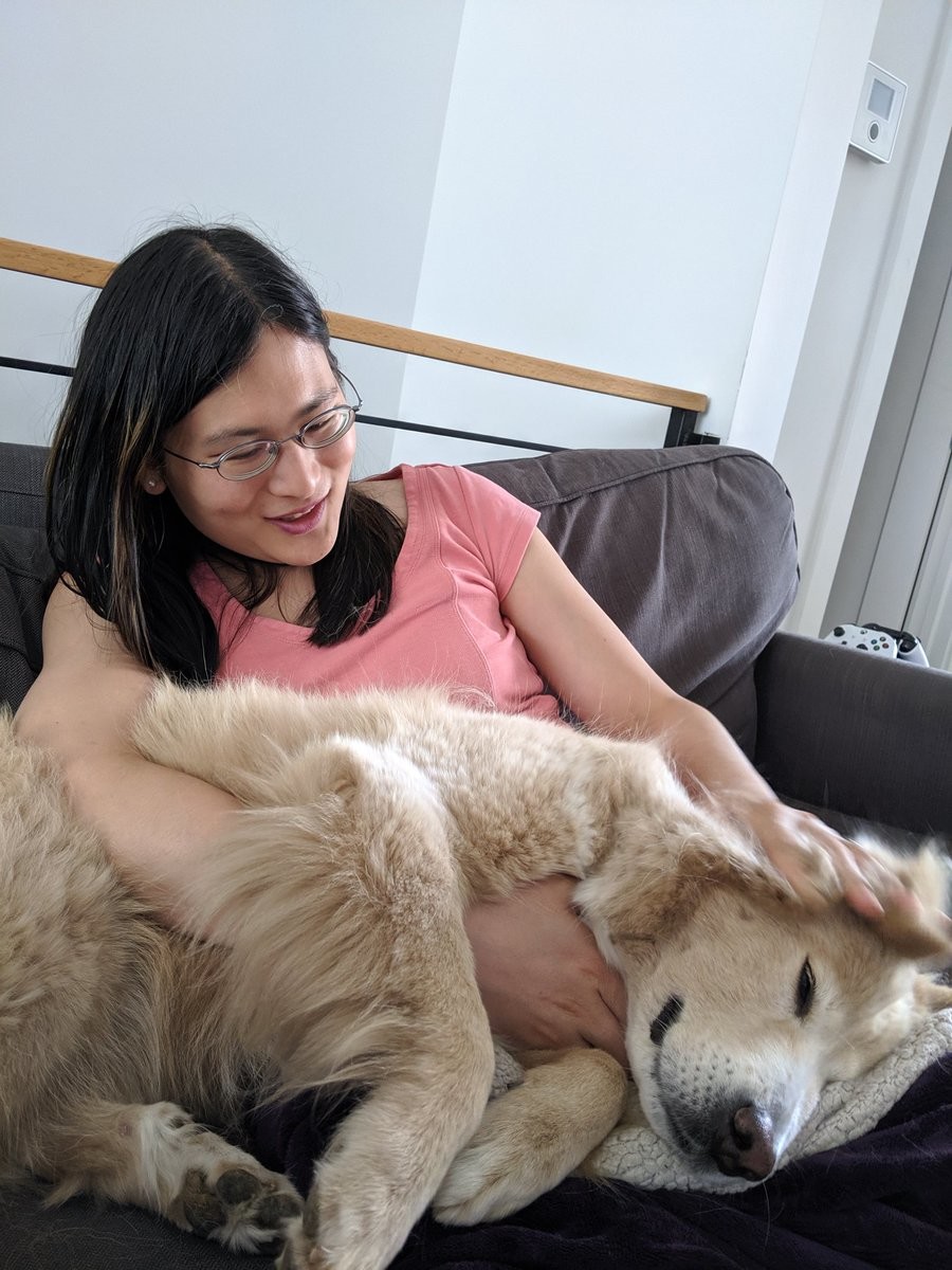 Liz petting and cuddling Fluffy