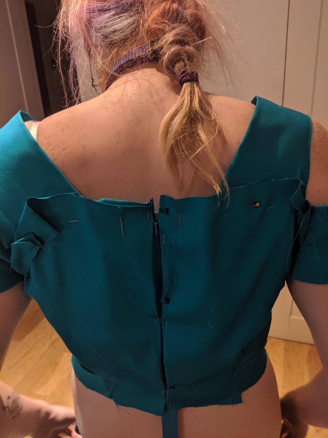 a bodice sewed up in blue fabric 