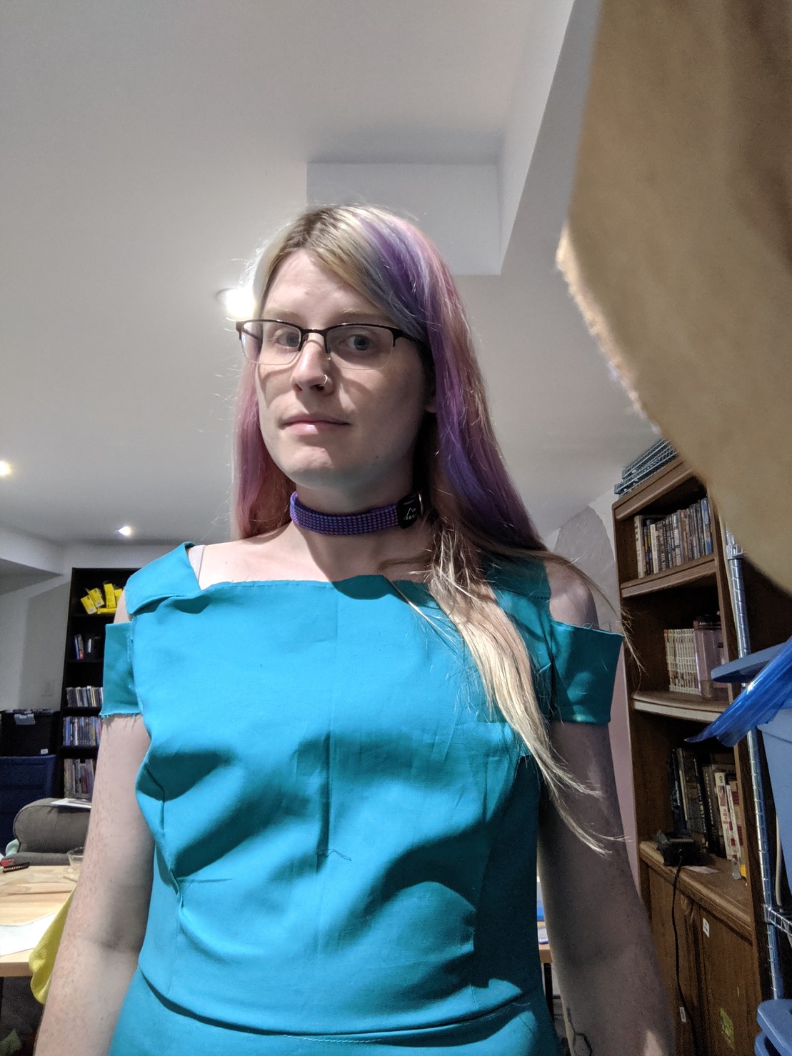 a loose-fitting blue dress