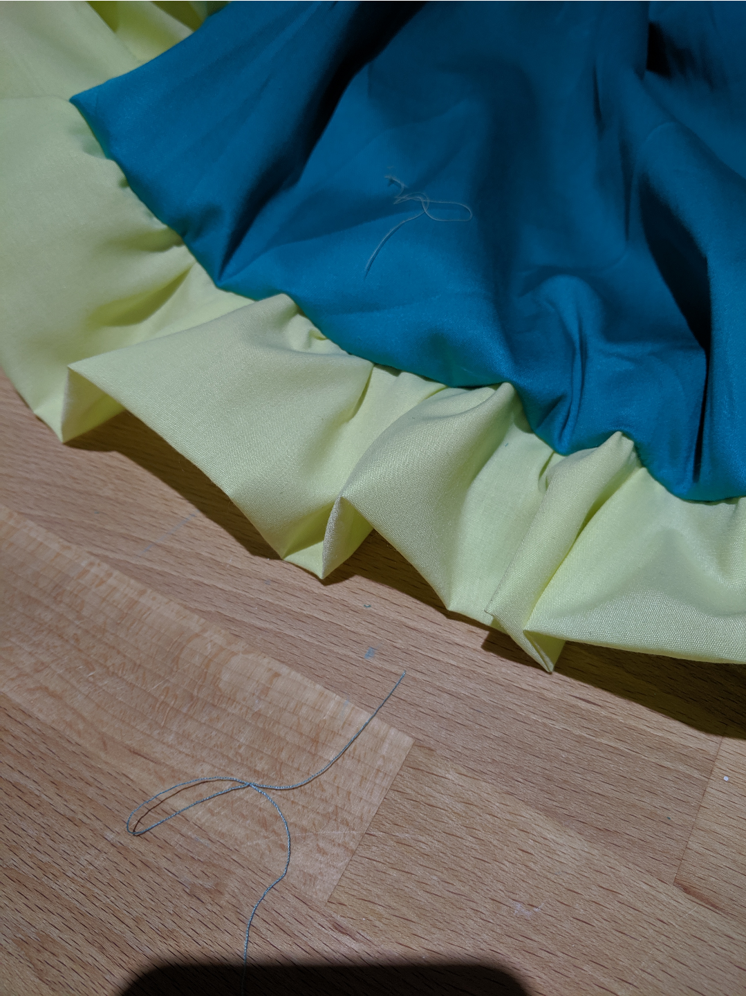 a blue skirt with a yellow fringing