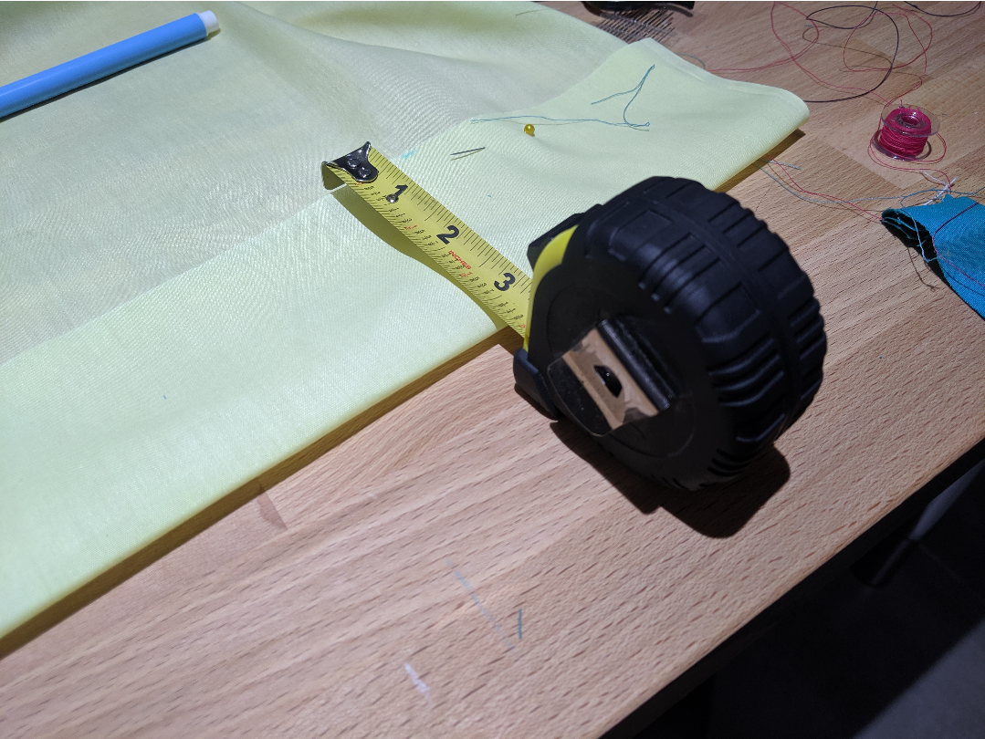 measuring cloth with a big industrial looking tape measure