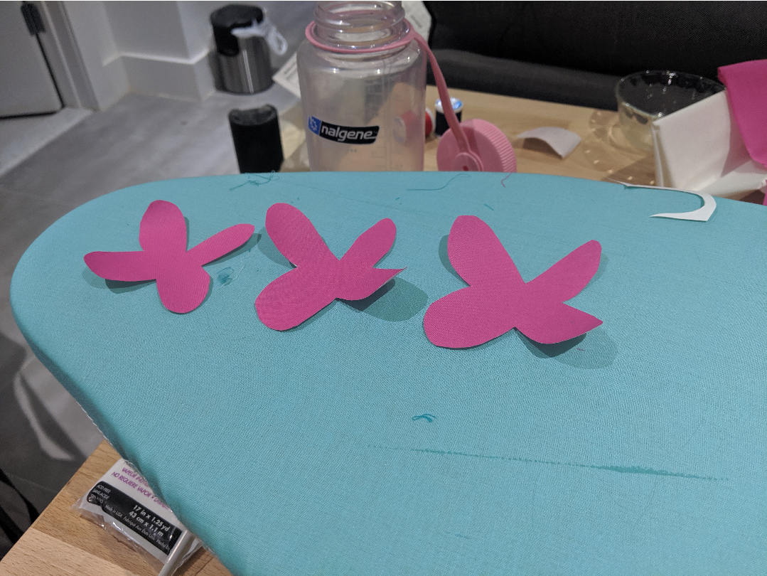 a row of pink butterflies