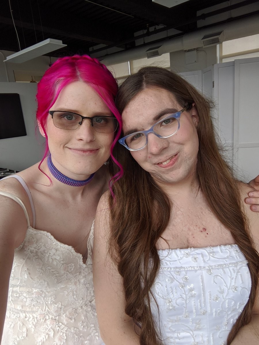 Natalie and I in wedding dresses