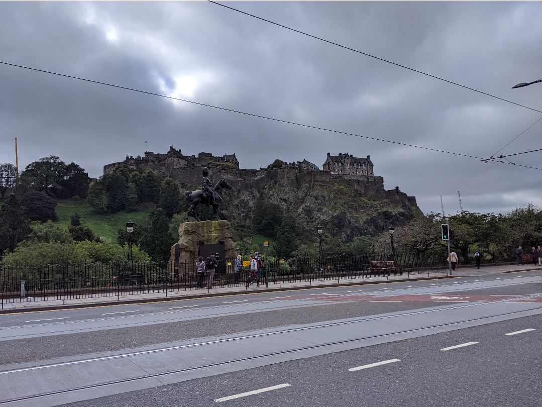 a castle on a large rocky escapement