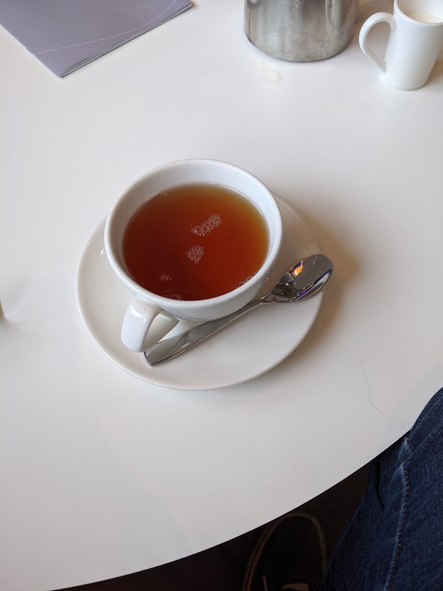 Cup and saucer of black tea