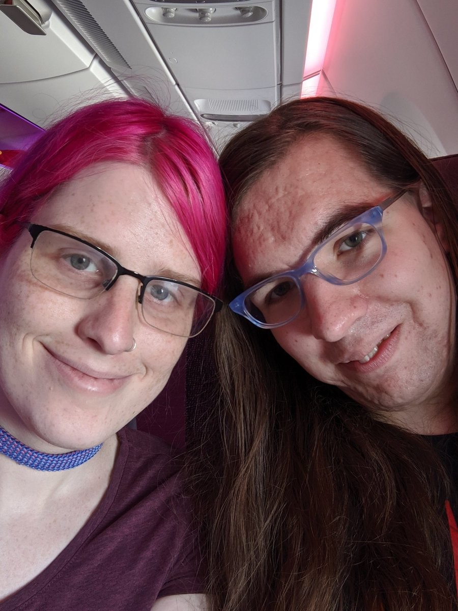 A selfie of me and Natalie on an airplane