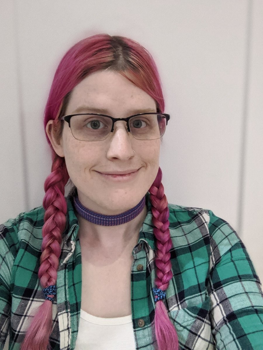 Me in plaid and two long braids