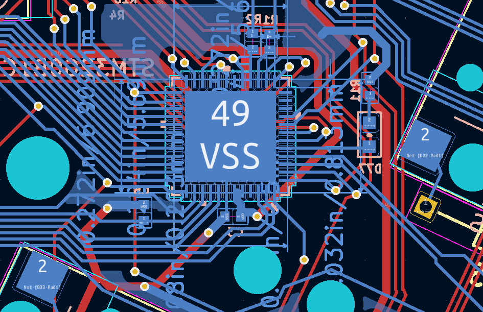 A visual overview of what will become a circuit board. A large blue circle labelled "VSS" is in the centre, and thin blue lines radiate out. IN the background, red lines also fan out.